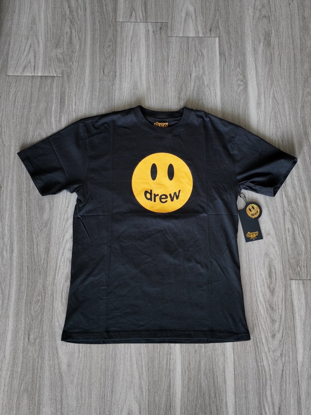 drew house Black Tee with Yellow Smiley Logo